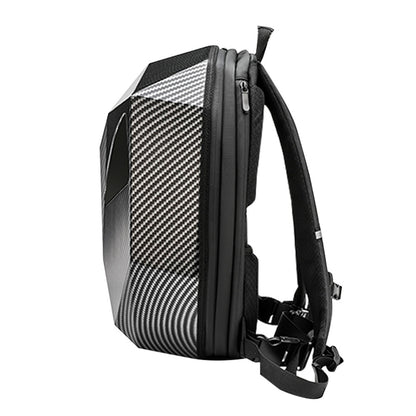 Side profile of the Sentinel backpack showing the depth of the moulded hard shell, the zip line and the padded shoulder straps.