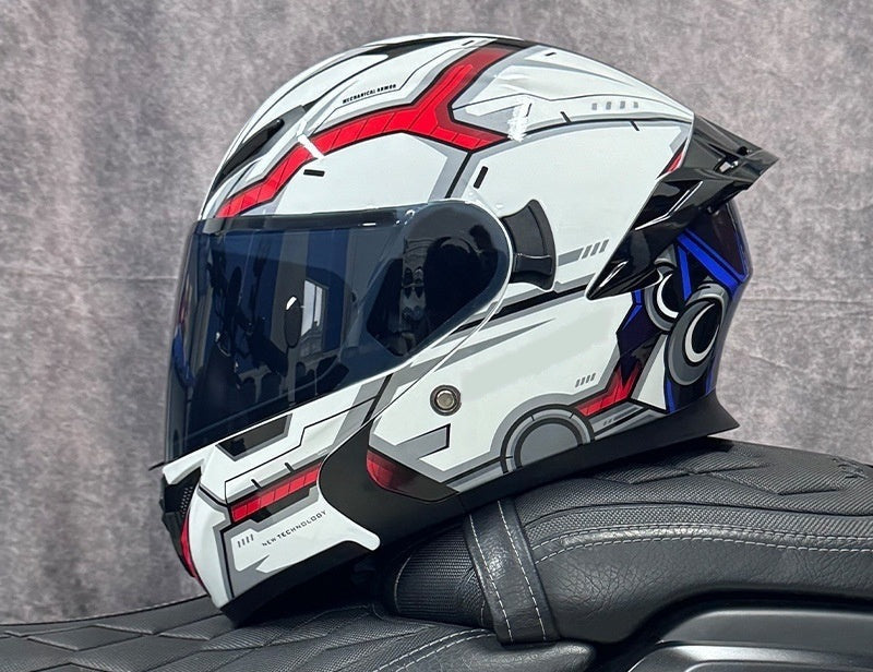 Pivot flip-up motorcycle helmet, white shell with red and blue graphics, fitted with the dark smoke outer shield