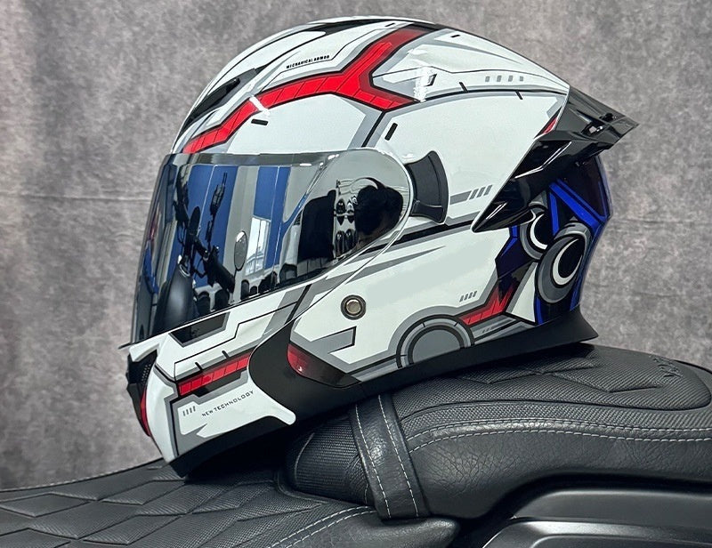 Pivot flip-up motorcycle helmet, white shell with red and blue graphics, fitted with the silver mirror outer shield