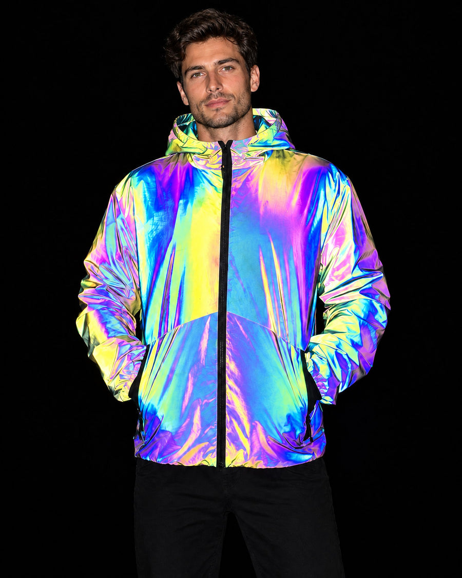 Men's reflective hooded jacket in Prism lighting up gold, violet, pink and blue under camera flash, front view